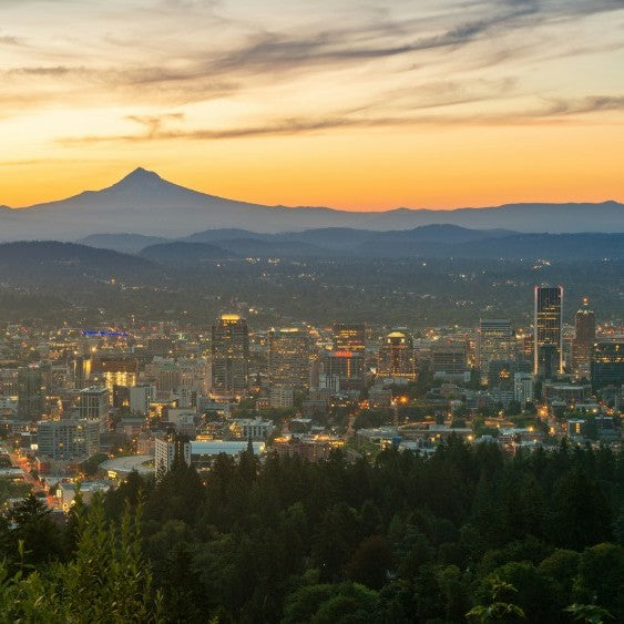 Sunrise view of Downtown Portland Oregon with Mt Hood in the background. 