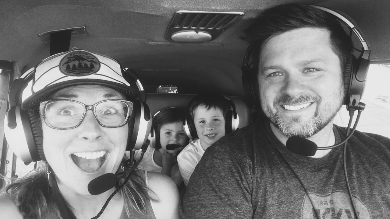 Family in airplane having fun on their way to enjoy a backcountry vacation